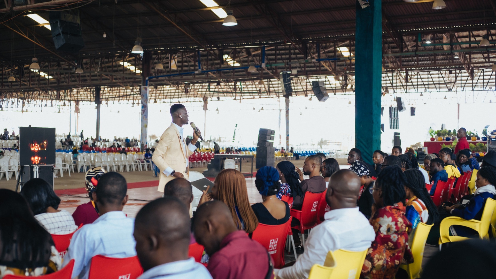 Prince Oluwatosin Odumosu speaking at a global media conference